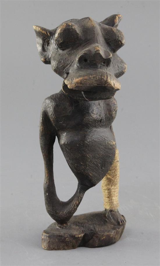 An African hardwood totem figure, 21cm